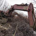 Pelleteuse démolition Sager abandonnée de la casse de Conflans