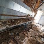 Mur effondré sur des lavabos collectifs au château Noisy Miranda