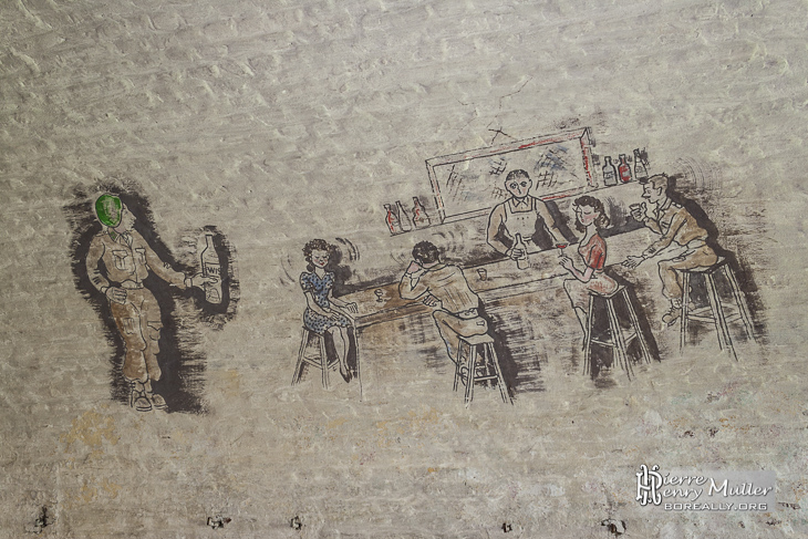 Dessin de soldats avec des femmes dans un bar sur les murs du Fort de la Chartreuse