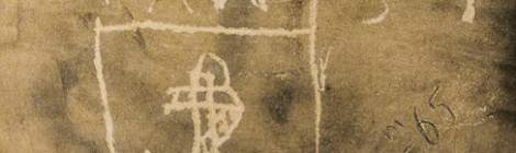 ...Insigne ancre de bateau grav&eacute; sur un mur....
