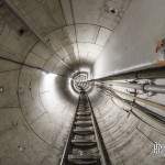 Galerie du tunnel technique avec le rail du train convoyeur